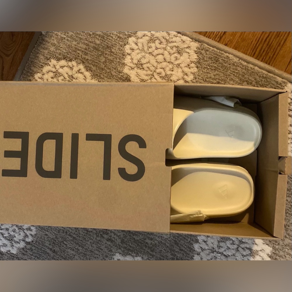 Mens yeezy slides in bone size 12..brand new in original box